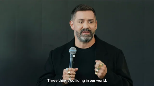 Speaker holding a microphone in Ledger’s Platform announcement video
