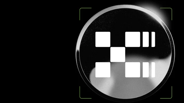 Silver-rimmed black coin with the white OKX mark inside green corner brackets on a black background