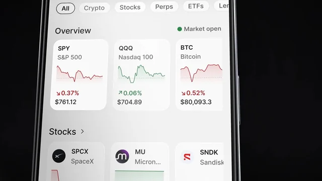 Backpack app Explore screen with SPY, QQQ and Bitcoin price cards above a row of stocks