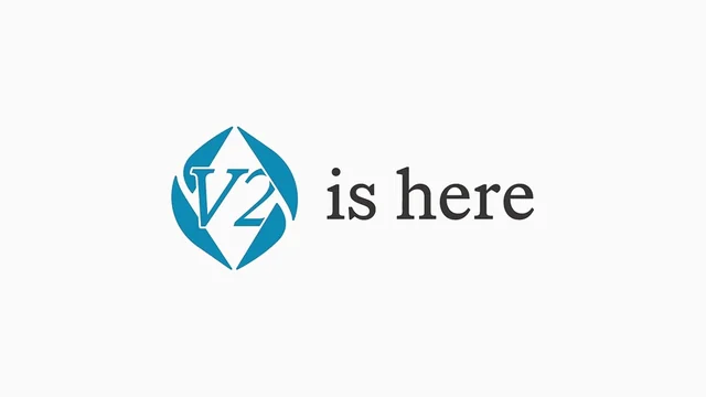 Blue ENS logo with V2 inside it next to the words is here, on a plain light grey background