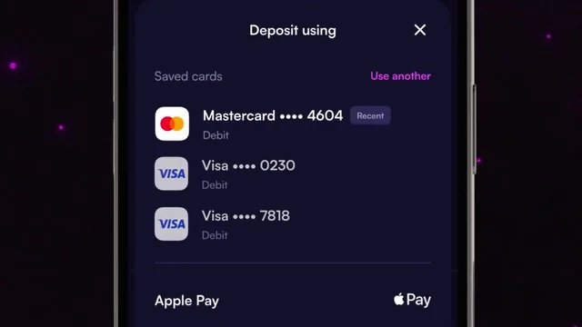 Moonshot deposit sheet from MoonPay's launch video, listing saved cards Mastercard ending 4604 marked Recent and two Visa cards above Apple Pay