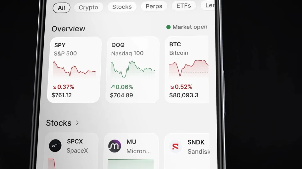 Backpack app Explore screen with SPY, QQQ and Bitcoin price cards above a row of stocks
