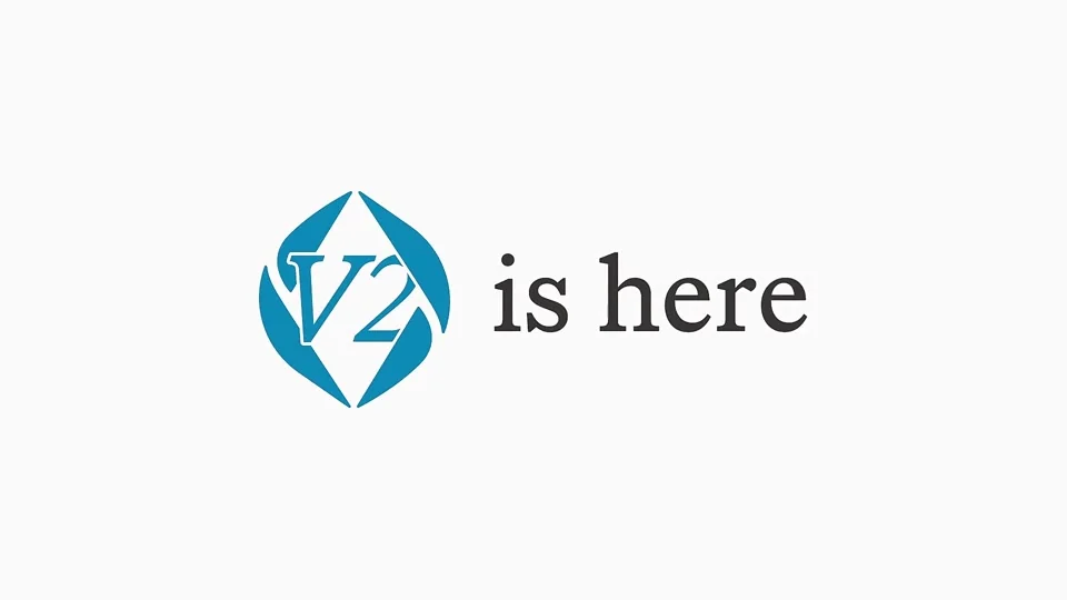 Blue ENS logo with V2 inside it next to the words is here, on a plain light grey background
